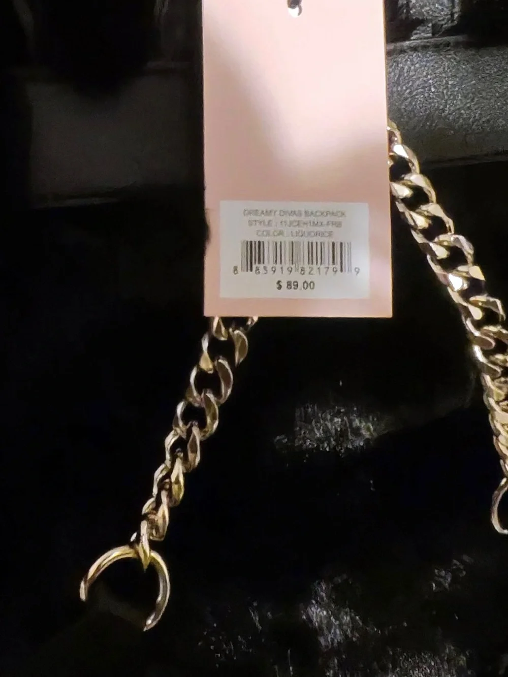 Juicy Couture Dreamy Divas black faux fur backpack with drawstring closure